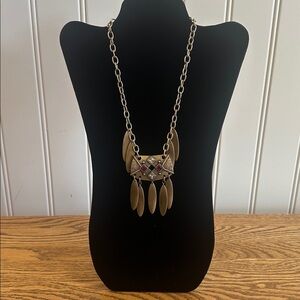 Gold Tone Geometric Pendant Necklace with red and clear rhinestones.